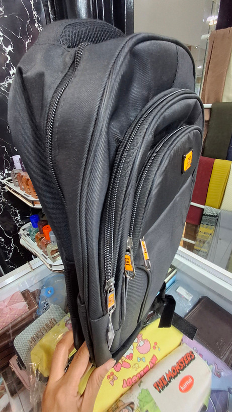کوله پشتی اسپرت مشکی طرح کت با جنس برزنت کج راه خرید کوله پشتی طرح Cat مشکی برزنتی | ۴ محفظه با پشت ضدتعریق | شهر کیف